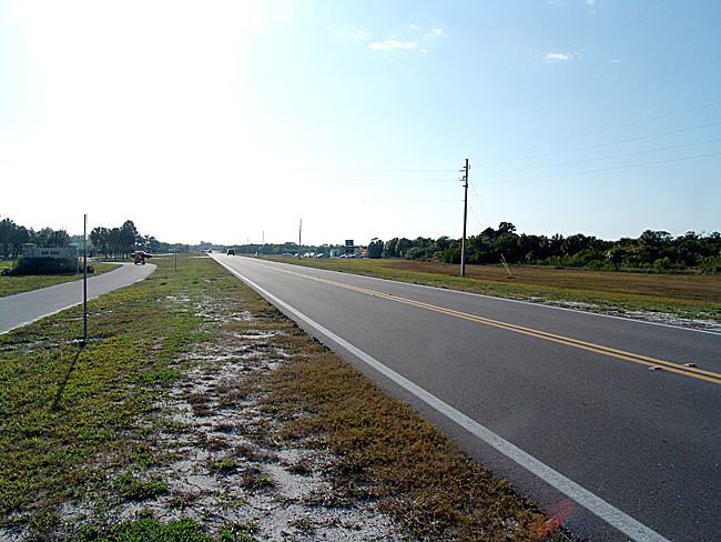 Just past the ittybitty car in the left lane, is the road curve that signals the first 4 mile split after looping out to the North Beach.